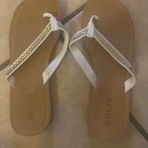 White guess flip flops